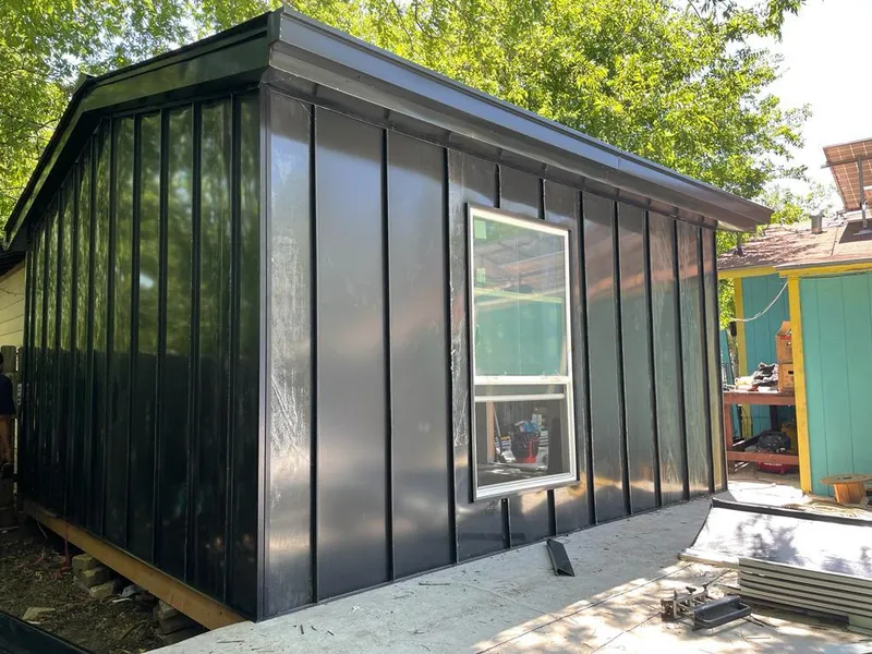 Black standing seam metal wall panels for Metal Roof Installation in Center