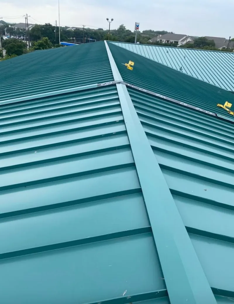 Green commercial metal roof ridge and valley for Metal Roof Repair in Center